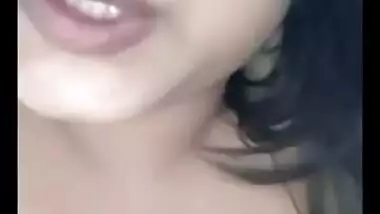 Beautiful girl showing her boobs