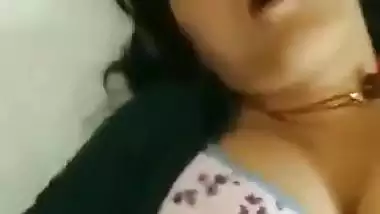Young guy fucks his busty office colleague in a hotel room